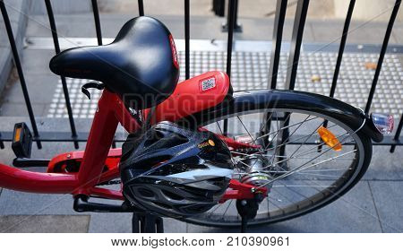 Sydney Australia - October 17 2017: Detailed view of a bike seat and back wheel from above. Sydney's Reddy Go bike-sharing service offers bicycles for rent.