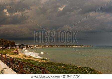Rain clouds on the Ionian Sea at the southeast coast of Sicily Avola Italy