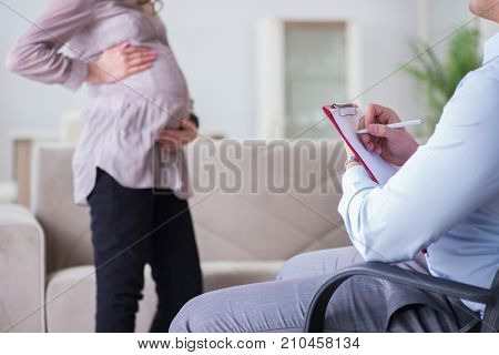 Pregnant woman visiting psychologist doctor