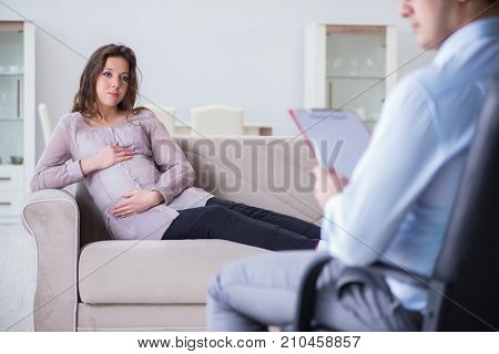 Pregnant woman visiting psychologist doctor