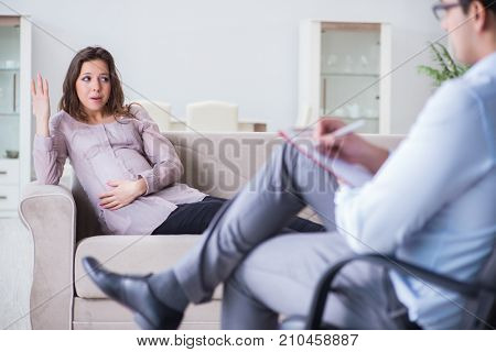 Pregnant woman visiting psychologist doctor