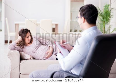Pregnant woman visiting psychologist doctor