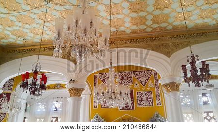 BENGALURU INDIA - FEBRUARY 20 2017: Interior decoration of famous Bangalore Palace. It was private residence of the royal Wodeyar family. It is filled with rare collection of art and paraphernalia from a bygone era.