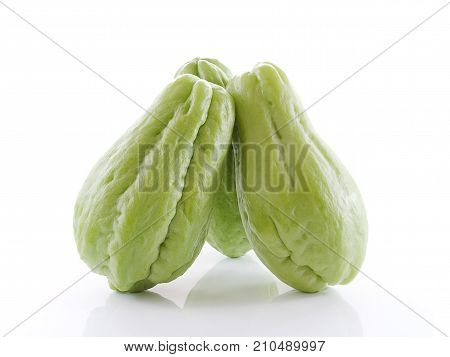 Chayote close up isolated on white background .
