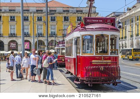 Lisbon PORTUGAL June 1 2017. Lisbon Old Red Tram is one of the most important tourist attractions. Line of tourists waiting to take Hills Tramcar Tour in centre of Lisbon