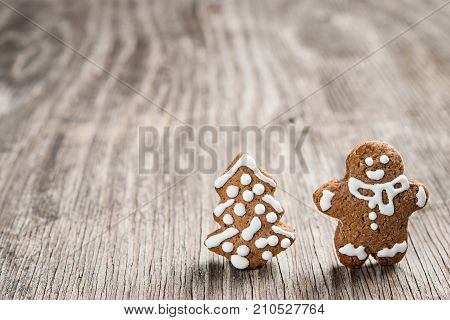 Gingerman And Christmas Tree Made Of Gingerbread Dough As Backgorund