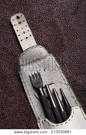 Leather Craft Tools On A Bordo Leather Background