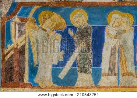 The annunciation Archangel Gabriel tells Mary that she will be pregnant. Mary visits Elisabeth. Fresco in a medieval church. Bjaresjo Sweden September 4 2014