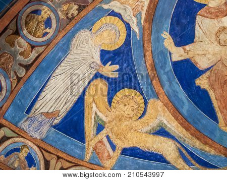 Virgin Mary and a lion in an medieval painting in Bjaresjo church, Sweden, November 6, 2009
