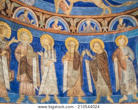 Six apostles in a medieval wall-painting a romanesque fresco in Bjaresjo church Sweden November 6 2009