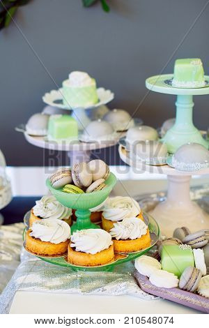 Modern stylish luxury wedding candy bar. a wide range of sweets on a wedding cande bar.