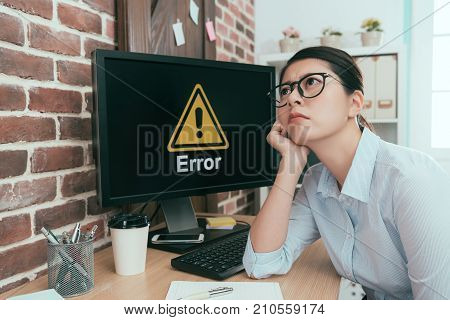 Depressed Office Worker Lady Sitting In Front Of Error Computer Daydreaming Thinking Working Solutio