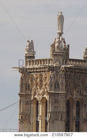 The tower Saint Jacques - Paris, France. The tower Saint Jacques is an isolated tower, built between 1509 and 1523, raised (drawn up) in the middle of the first Parisian public garden, which bears its name, in 4 District of Paris.