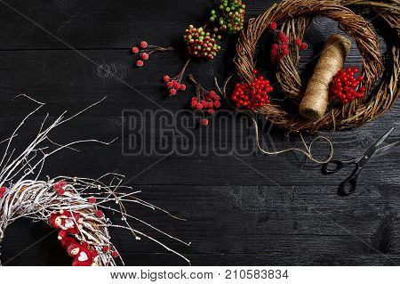 Make a Christmas wreath with your own hands. Workplace for preparing handmade decorations. Top view. Copy space. Still life. Flat lay