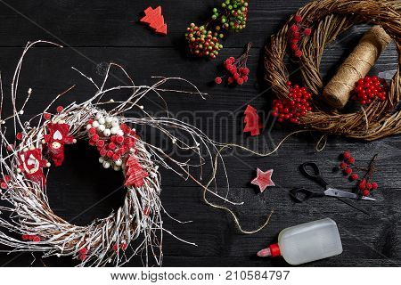 Make a Christmas wreath with your own hands. Workplace for preparing handmade decorations. Top view. Copy space. Still life. Flat lay