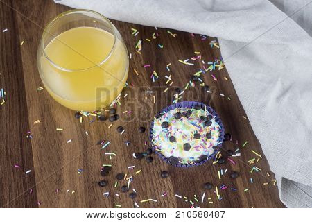 Tasty cupcakes on a white wooden table