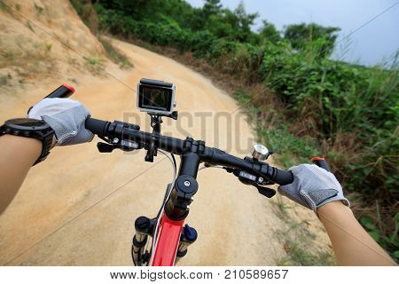 cyclist cycling mountain bike on mountain trail