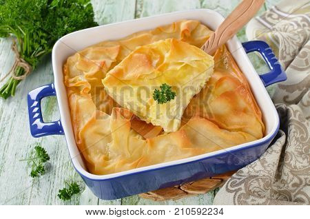 Cheese puff pie from unleavened dough. Georgian cuisine - khachapuri Achma