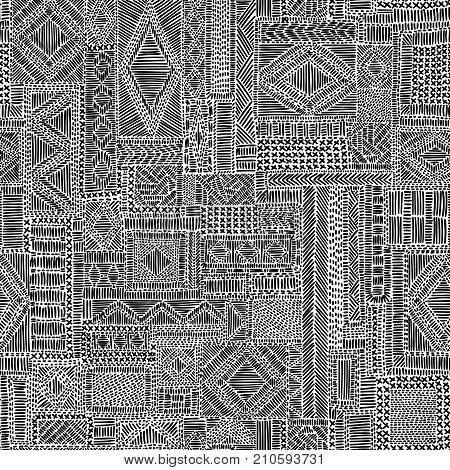 Embroidered seamless pattern. Black and white complex ornament. Handmade. Print in the patchwork style. Vector illustration.