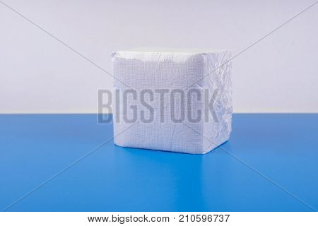 paper napkin isolated on white turquoise background.
