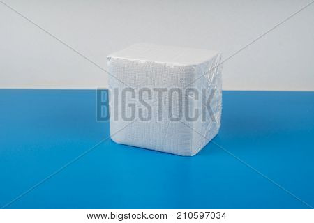 paper napkin isolated on white turquoise background.