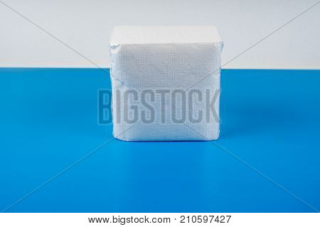 paper napkin isolated on white turquoise background.