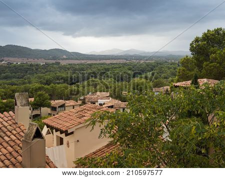 view from cap vermell inside mallorca on a cloudy day in september