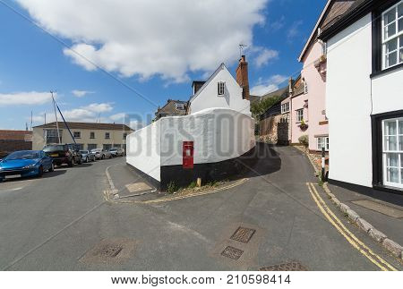 The fork of a narrow road in a small English city. Topsham. Devon. UK
