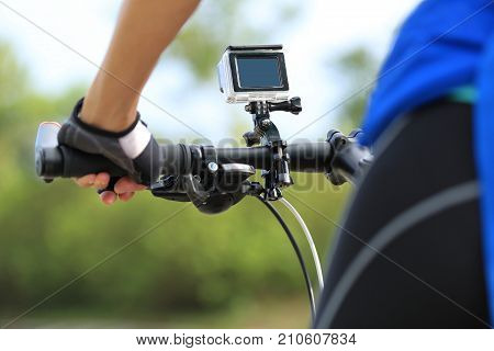 young woman cyclist cycling mountain bike outdoor