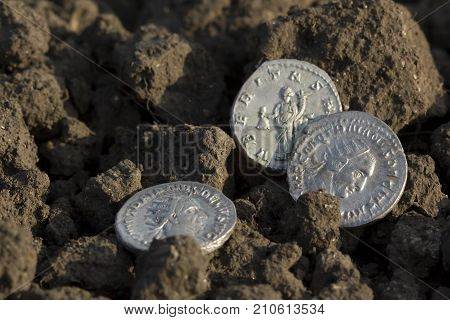 Roman Silver Coins Covered In Dirt