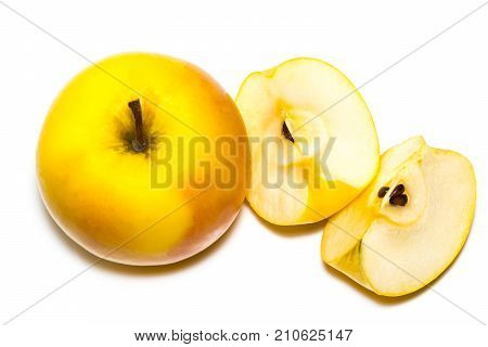 Ripe Yellow Apple Fruit And Apple Half Isolated On White Background