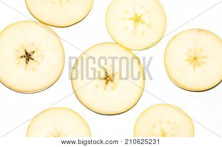 Slice of yellow apple fruit isolated on white background.