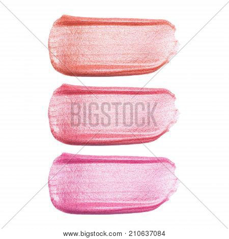 Set of different lip glosses smear samples isolated on white. Smudged makeup product sample.