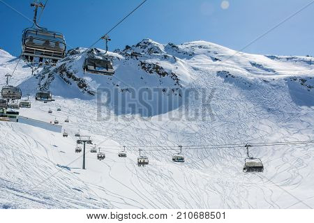 Ski and cable car on the ski resort in Austria Alps. Winter landscape.