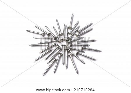 Metal Nails Arranged In A Circle Isolated On A White Background