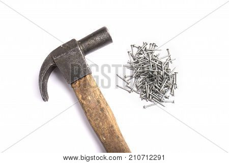 Metal Nails And A Hammer Isolated On A White Background