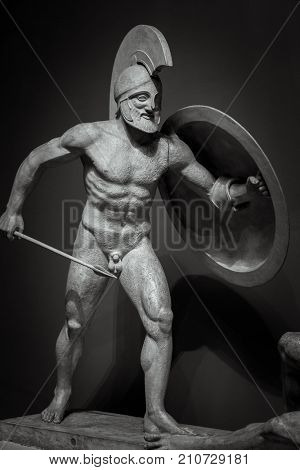 Man in helmet Greek ancient sculpture of warrior