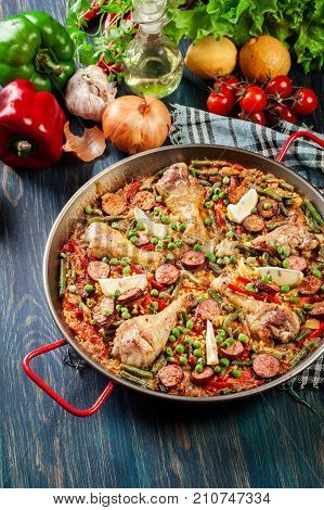 Traditional Paella With Chicken Legs, Sausage Chorizo And Vegeta