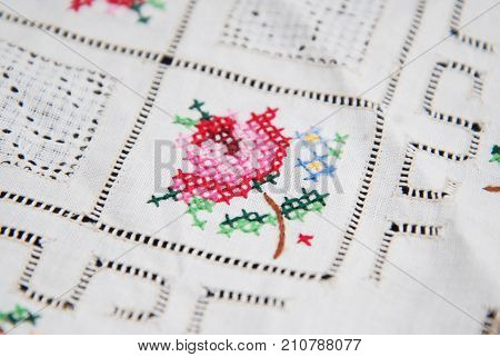 Embroidered Rose flower on napkin. Vintaege handmade