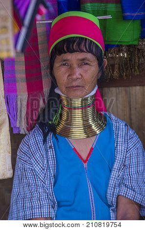 KAYAN STATE MYANMAR - SEP 09 : Portrait of Kayan tribe woman in Kayan state Myanmar on September 09 2017 Kayan tribe woman are well known for wearing neck rings.