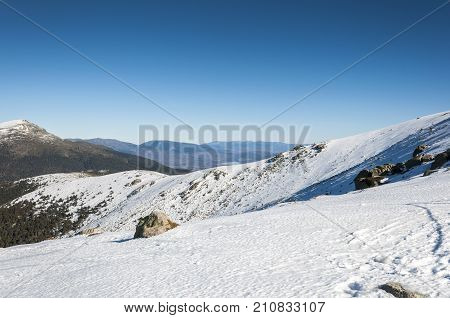 Views of Guadarrama Mountains from Navacerrada Ski Resort Navacerrada Mountain Pass Madrid Spain on January 4 2015.