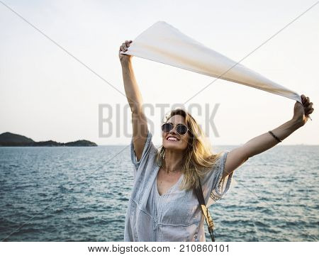 Woman smiling and chill out by the sea
