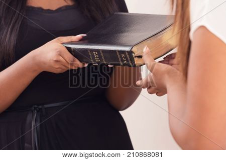 Girl Giving A Bible And Spreading The Good News