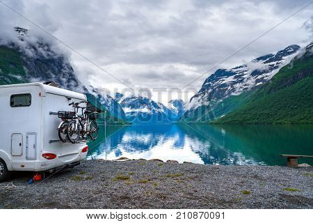 Family vacation travel RV, holiday trip in motorhome, Caravan car Vacation. Beautiful Nature Norway natural landscape.