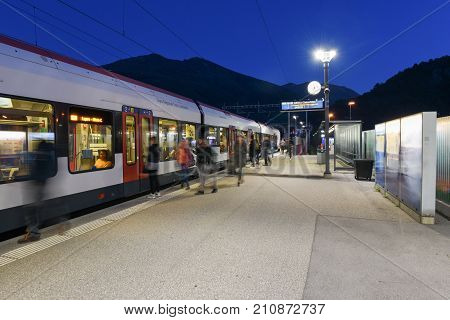Train Station Of Lamone With People On Movement