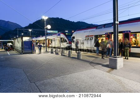 Train Station Of Lamone With People On Movement