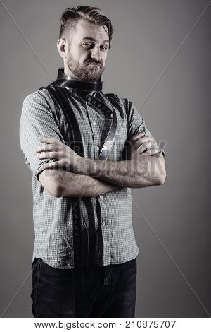 Beautiful Hipster Man In A Scarf From An Old Photographic Film