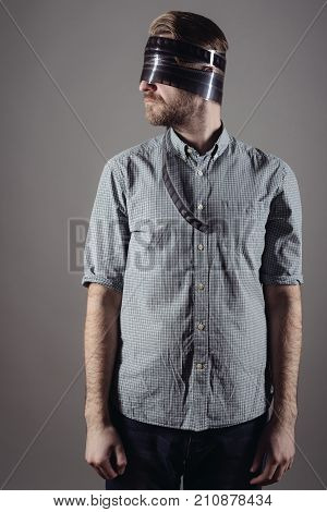 Cheerful Man A Projectionist With A Bandage On His Head From A Film