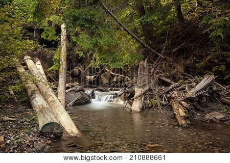 Closeup of Beautiful waterfall in Carpathian mountains, Ukraine.