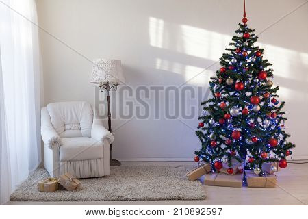 Christmas Tree With Christmas Gifts In White Hall On Christmas 1